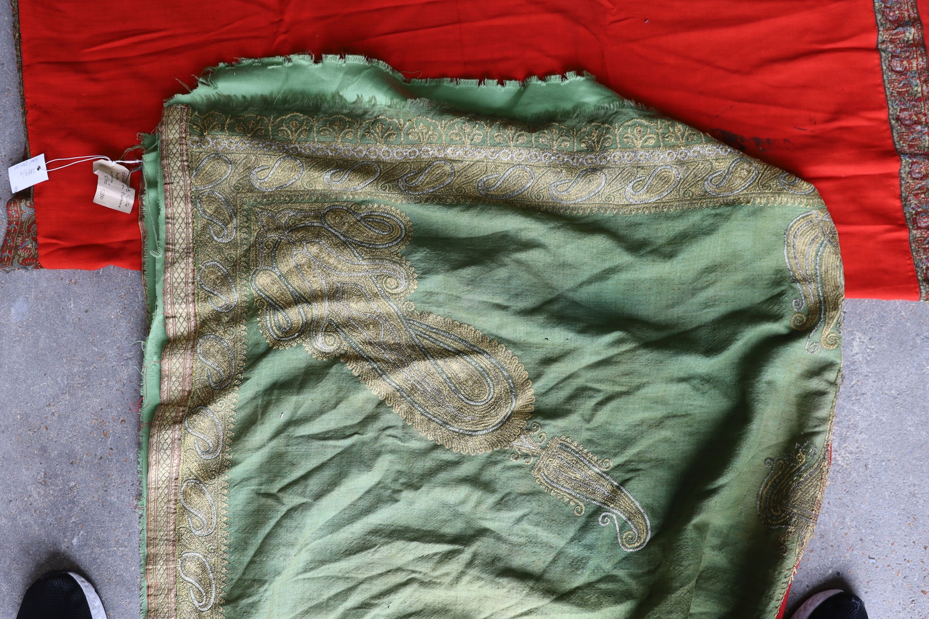 A silkwork shawl (a.f.) 270 x 140cm and an Indian embroidered cloth, 185 x180cm